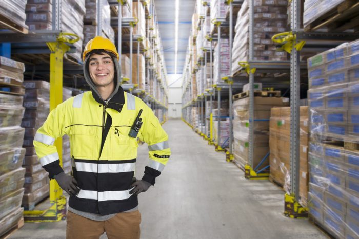 man in warehouse wearing winter PPE